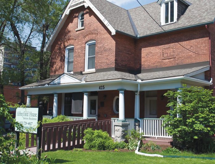 An exterior shot of Abbeyfield House in Ottawa on a sunny day