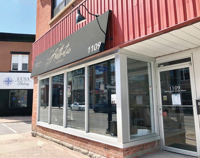 The exterior of the Aesthetic Lounge on Wellington Street West on a sunny day