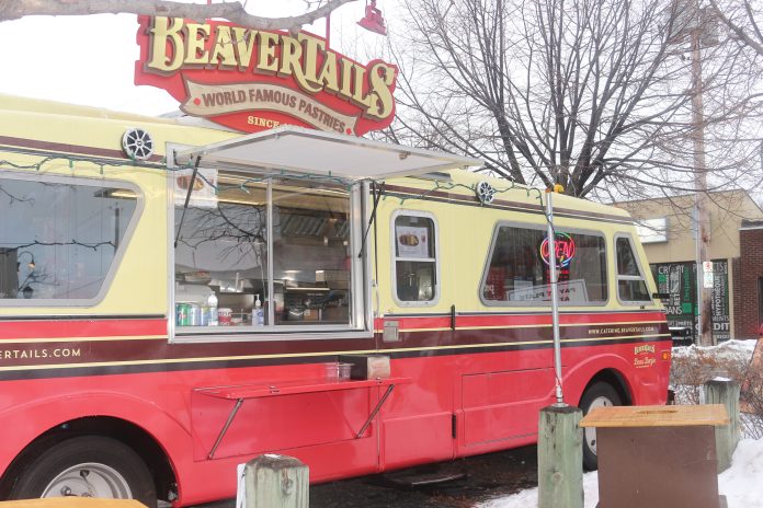 The “Beau Benji” serves up beavertails in the parking lot of West Park Lanes Bowling Alley.|Participants in the Hintonburg Community Centre's Broadway Workout. pose for a photo.|