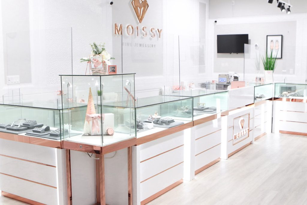 The interior of Moissy Fine Jewellery with white and rose gold counters