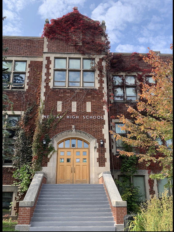 The exterior of Nepean High School in fall.