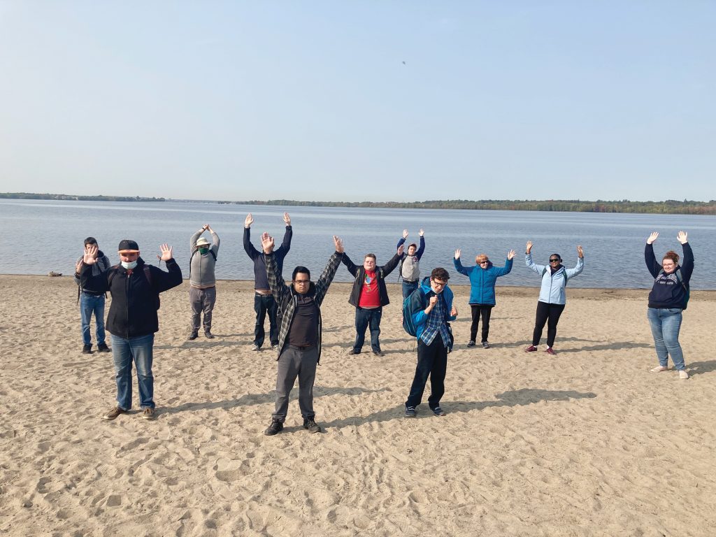 A photo of the members of WAVE outside at Westboro Beach.