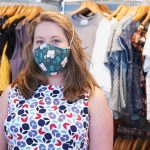 A photo of Helen Peterson wearing a mask at Flock Boutique in Westboro.