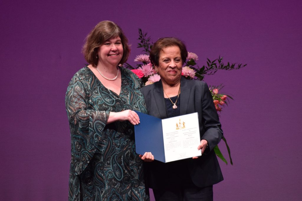 Salma is pressnted an award by Ottawa-West Nepean MPP Anita Vandenbeld. 