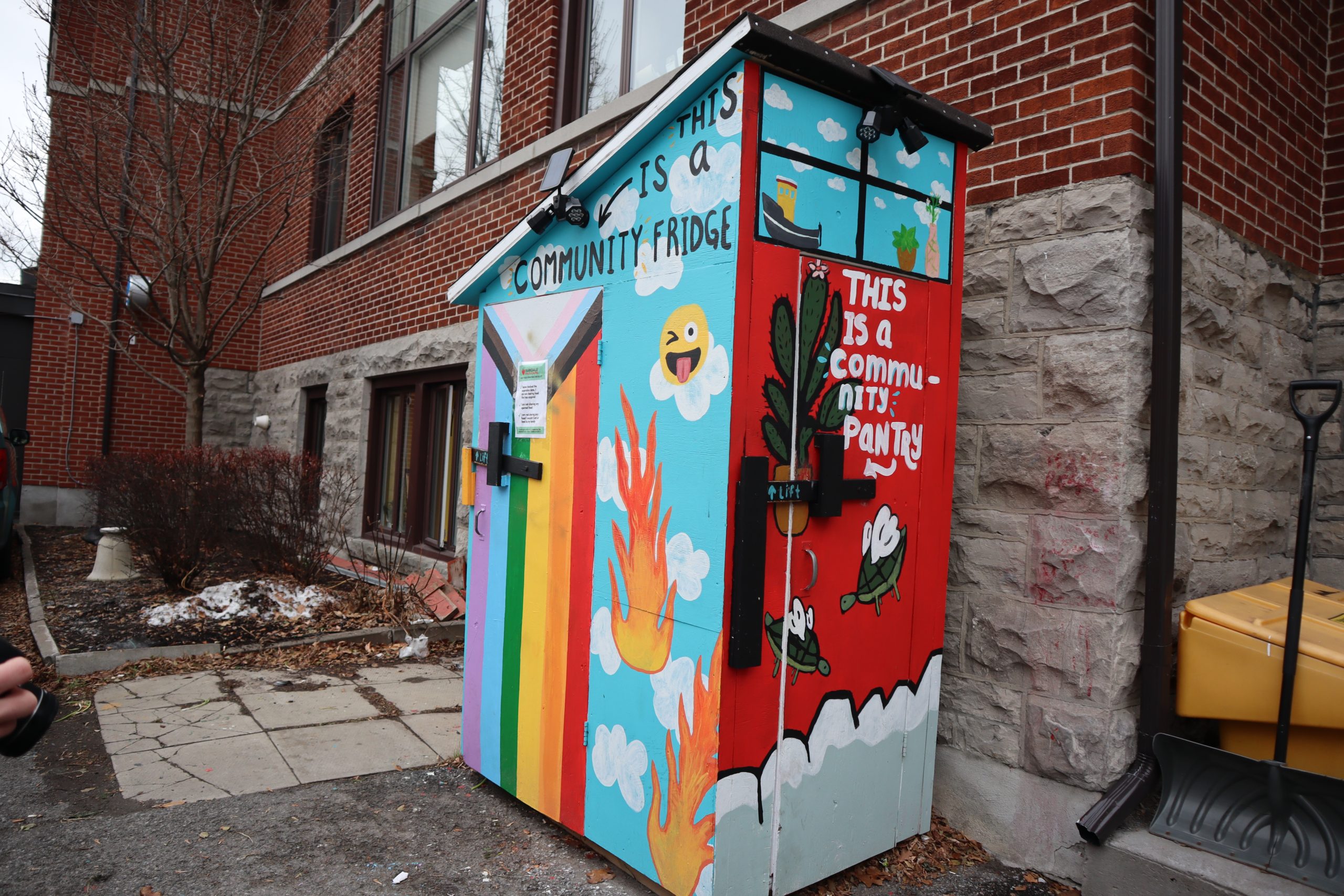 A colourful shed outside of the Parkdale Food Centre. Inside is where the community fridge is.