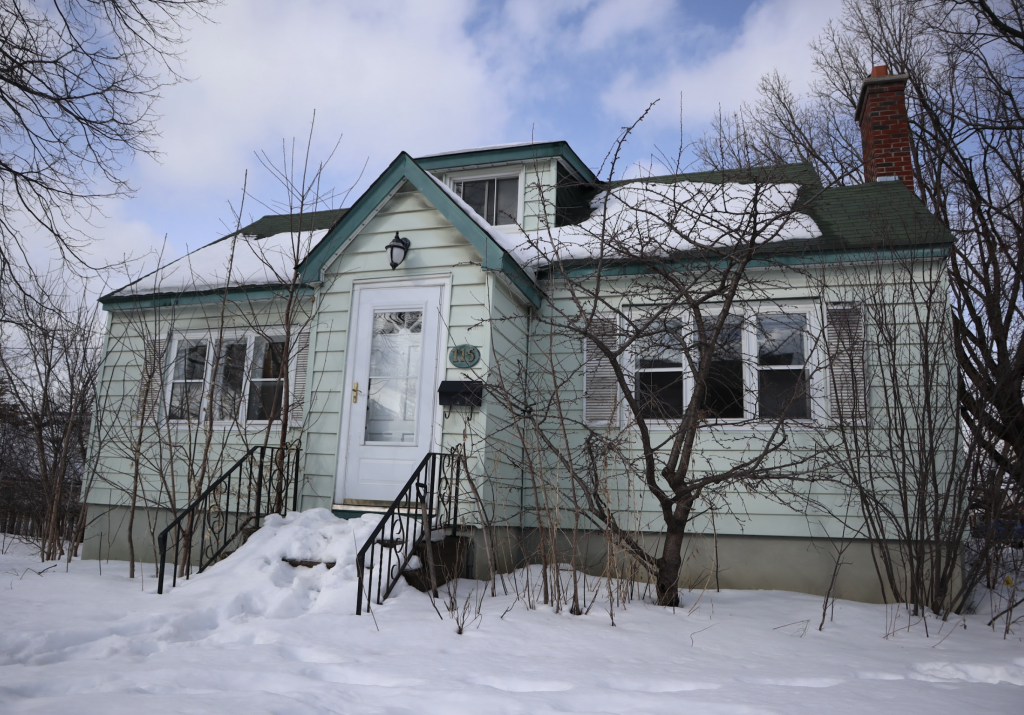 A green house on Armstrong.