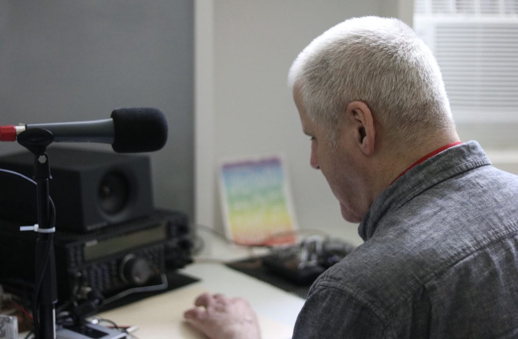 Duncan works away on his audio equipment. 