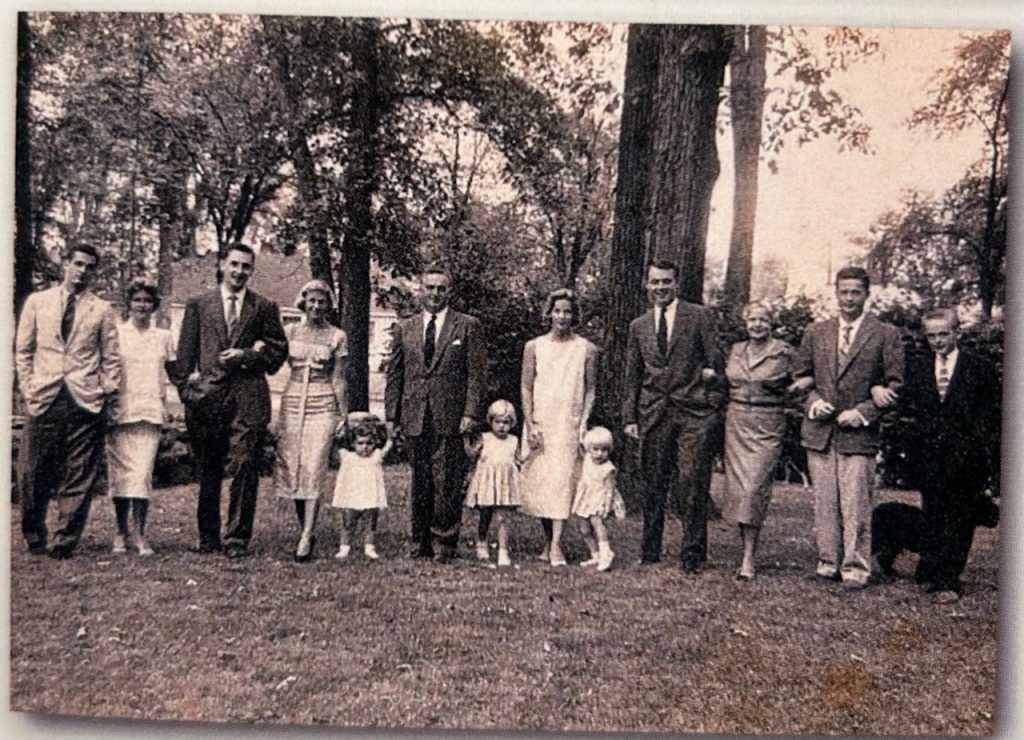 A black and white family photo. 