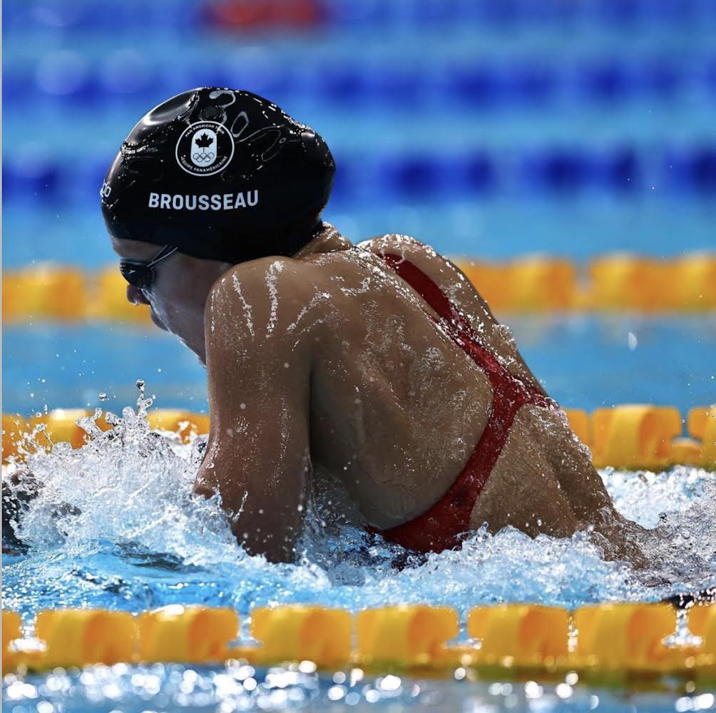 Julie swims in a pool. 