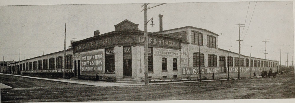 The exterior of a large warehouse type building 