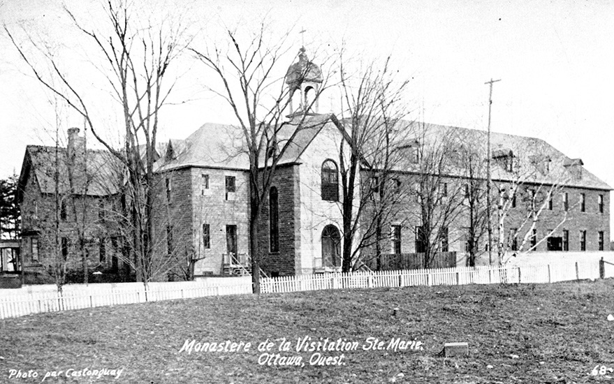 An old black and white photo showing the outside of the  convent 