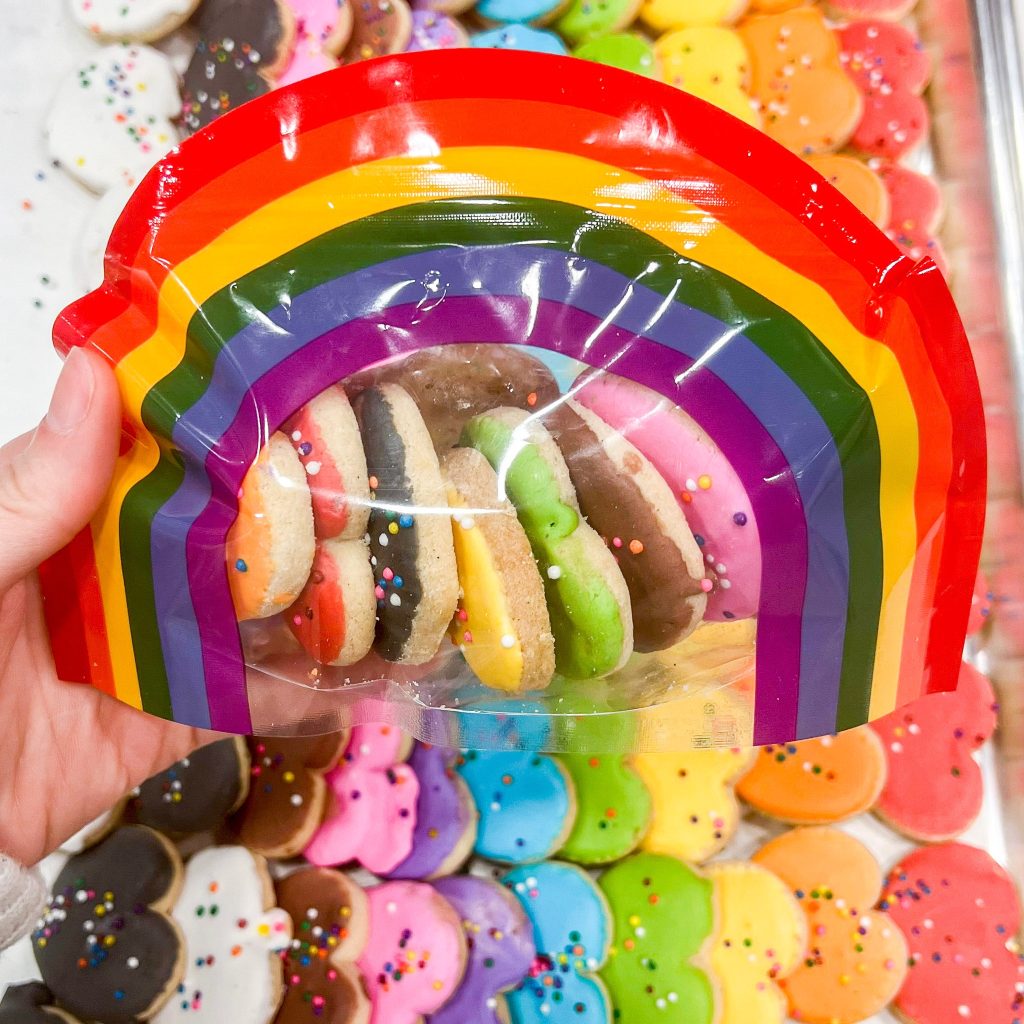 Colourful cookies are sitting in a bag. 