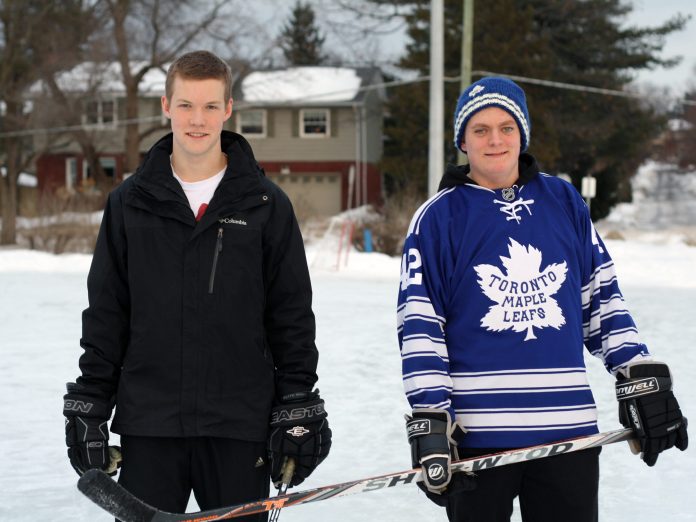 Rink attendants Aidan Worswick (left) and Patrick Johnston at the double surface McKellar Park rink. Photo by Anita Grace.|