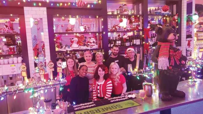 Staff at the Savoy pose behind the bar as they get ready for Miracle Pop-up.|Miriam Lautru