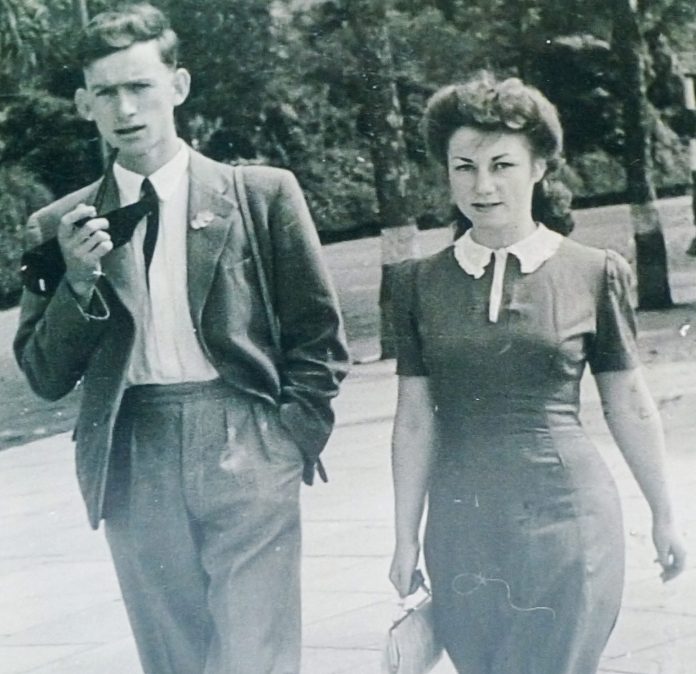 |George and Jean Spear on their 72nd anniversary. Jean’s red dress and white lace collar is a replica of the dress she was wearing when they first met