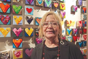 “I came out tonight to support my neighbourhood. I own an art gallery across the street and there are a lot of women who run businesses in this area and we all support each other for our events,” says Melodie Sadler.