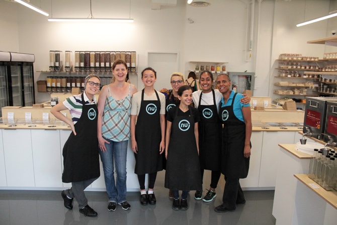 The management and employees of Nu Grocery gather for a group photo on their “soft” opening day, which was heavily attended despite heavy rain. (L-R): Sia Veeramani, Valérie Leloup, Khema Stein, Kylie Shaw, Faezeh Khatami, Jasmine Acharya, and Sarah Parker. Photo by Jacob Hoytema