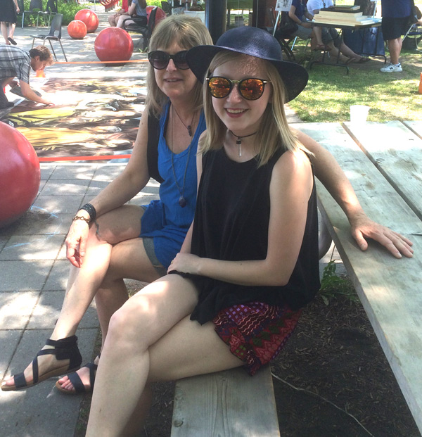 Barb Allen and her daughter, Maya, visit ArtsPark every year. These two Kitchissippi residents enjoy perusing and shopping at the craft vendors row, the music, the artists, and catching up with neighbours and friends.