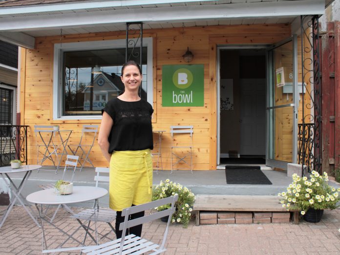 The Bowl founder and owner Kristy Gaetz stands at the location of her new restaurant on Holland Avenue. Kirsty says the minimalist decor inside reflects the streamlined