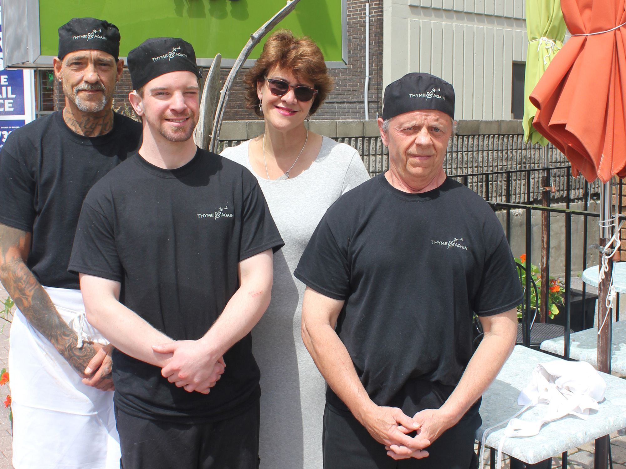 Sheila Whyte with Chris, Ben, and Mark. Photo courtesy of The Ottawa Mission. 