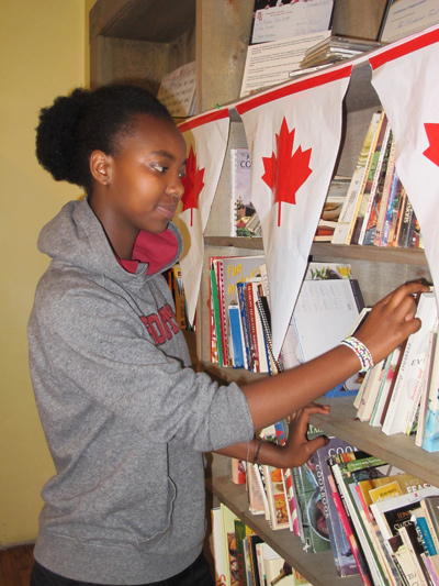 Immaculate, 15, was born in Congo and lived in Kenya for seven years before moving to Canada with her family. It was here that she really became a reader. Photo by Andrea Prazmowski